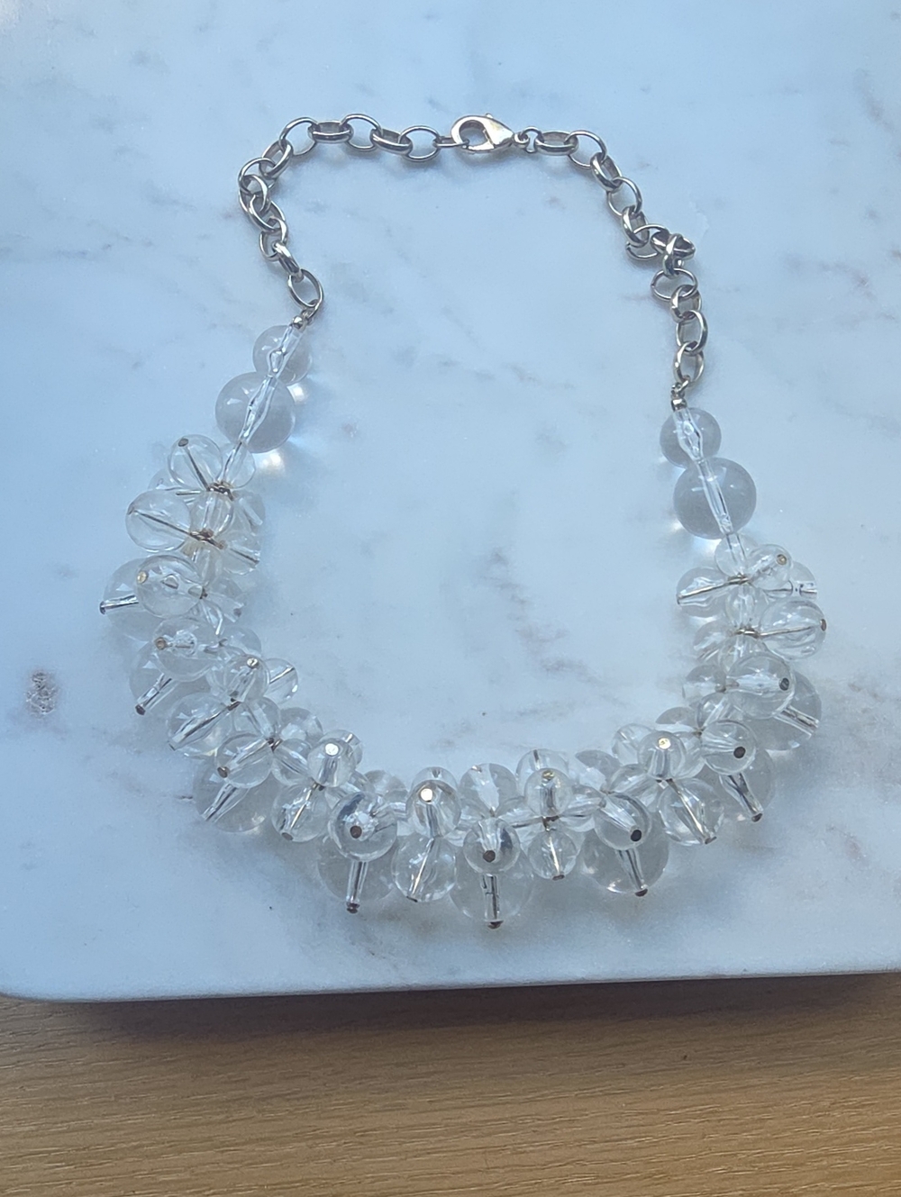 clear acrylic bubble bead statement necklace features a chunky clustered bib